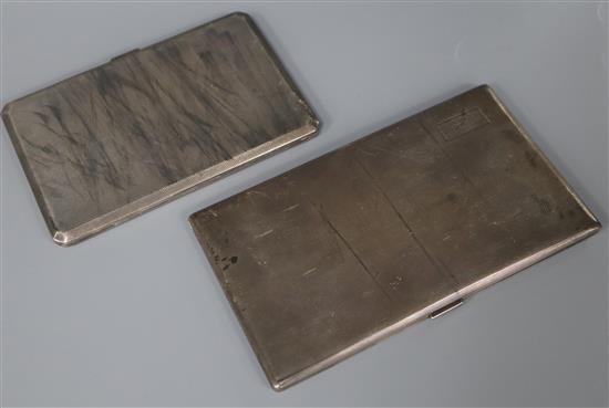 Two engine turned silver cigarette cases, largest 15.2cm.